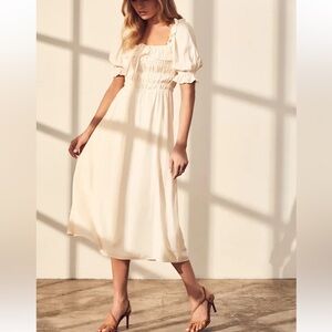 Lulu’s Nahanni Cream Smocked Midi Dress